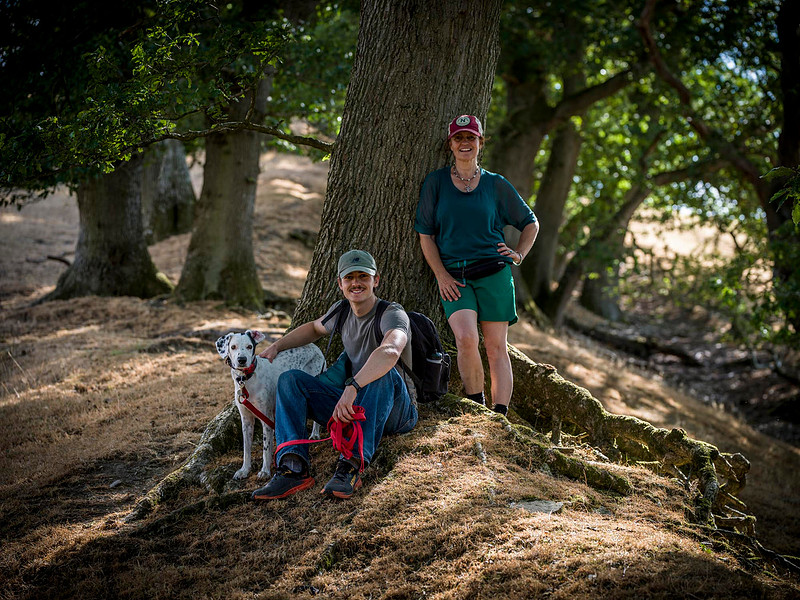 People and dog on walk on Offas Dyke posing for a photo
